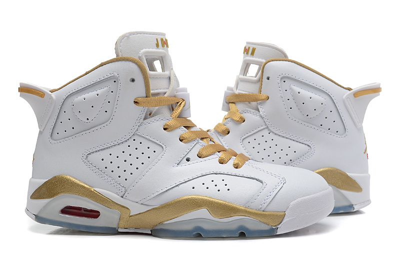 jordan gold and white shoes